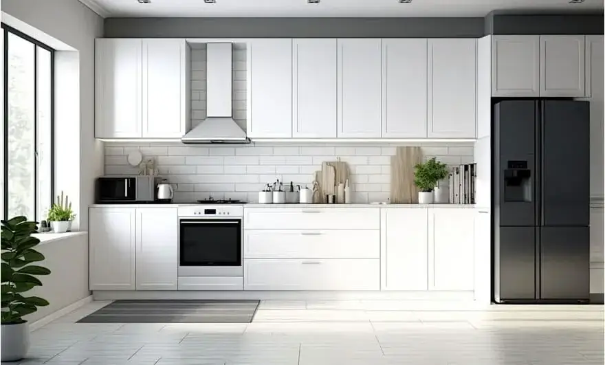 Stylish kitchen featuring a straight modular design with white cabinetry, built-in appliances, and a concrete floor, offering a modern and sleek aesthetic.